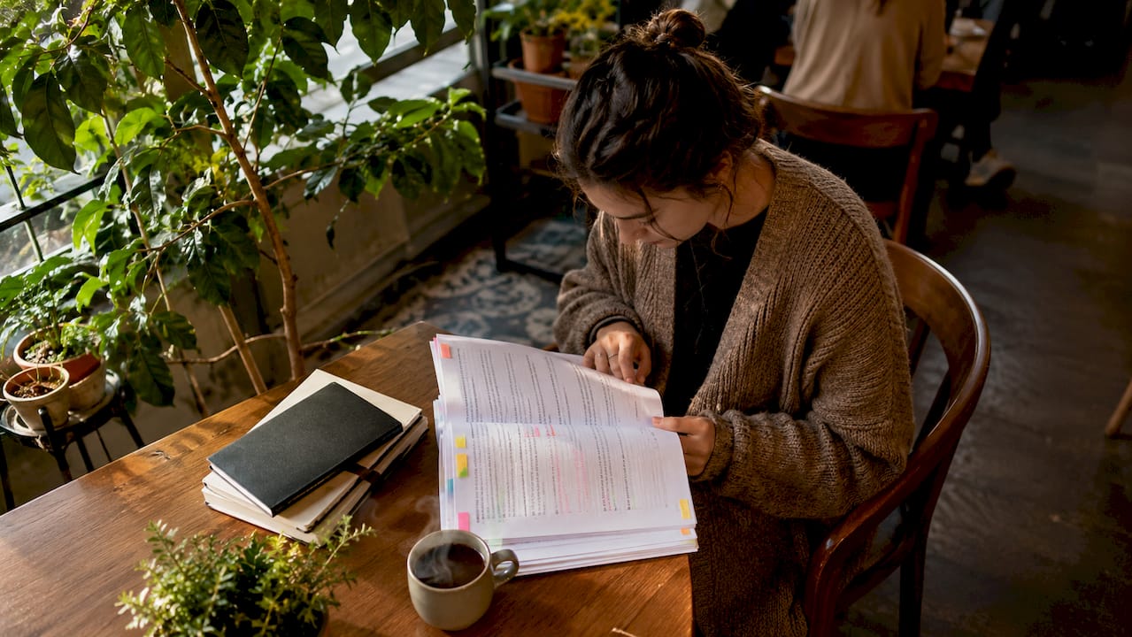 Educator reviewing teaching portfolio documents