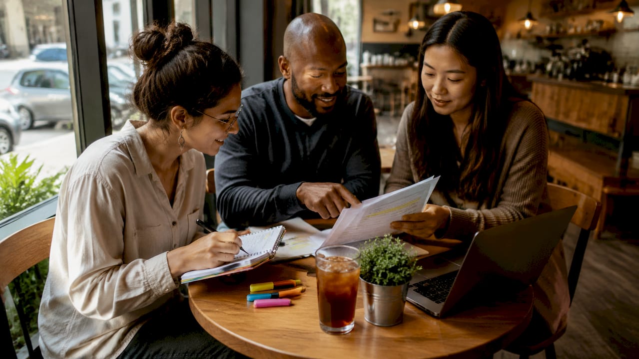 Group reviewing TEFL CV skills and experience