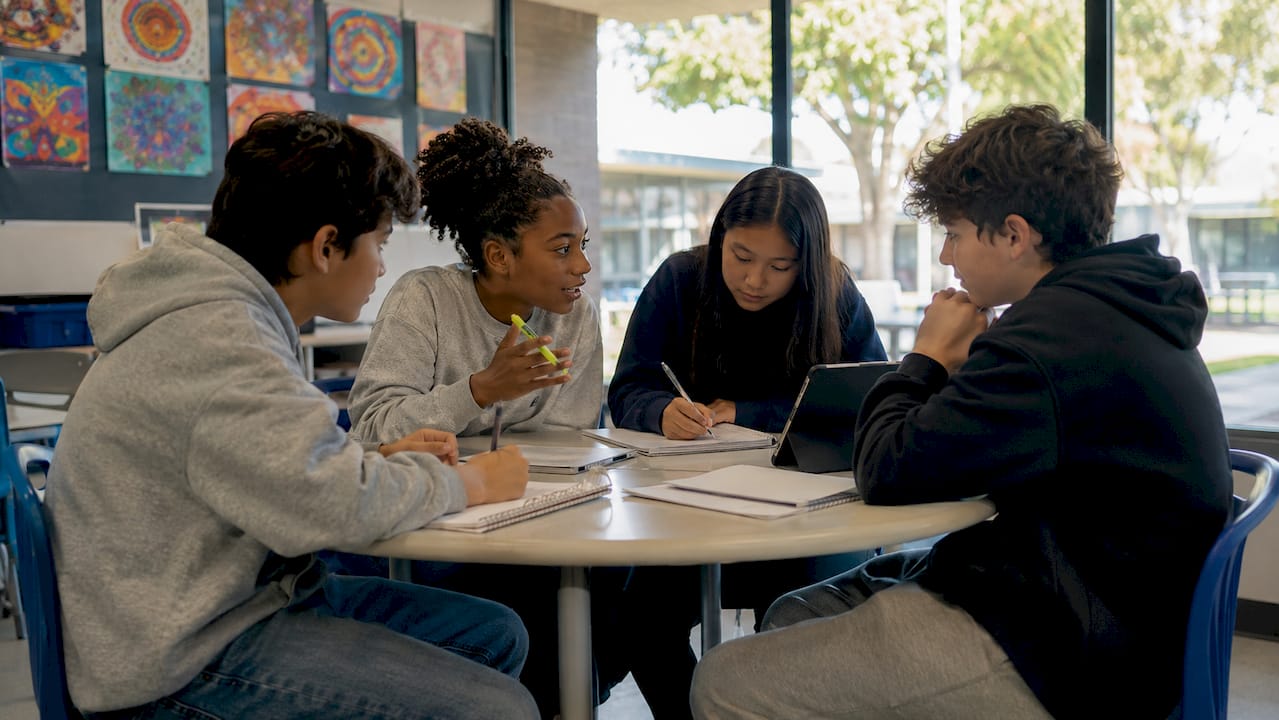 Students discussing autonomy in classroom