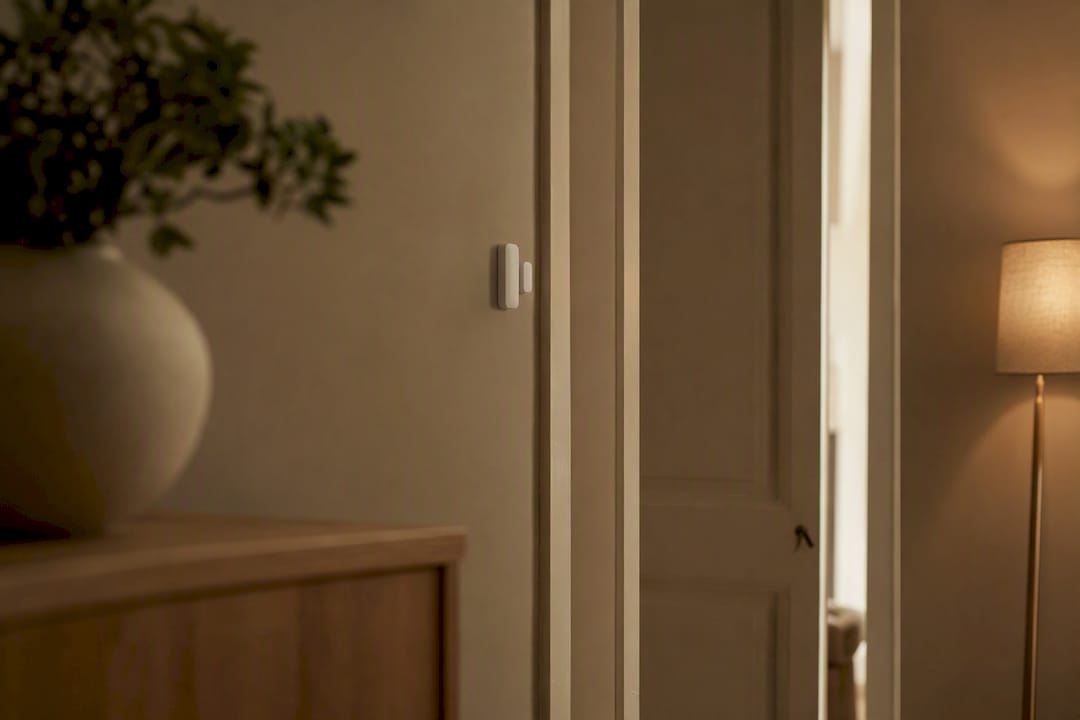 Door sensor and smart hub in a home entryway