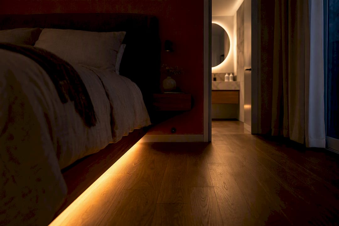 Warm hidden bedroom path lighting at night