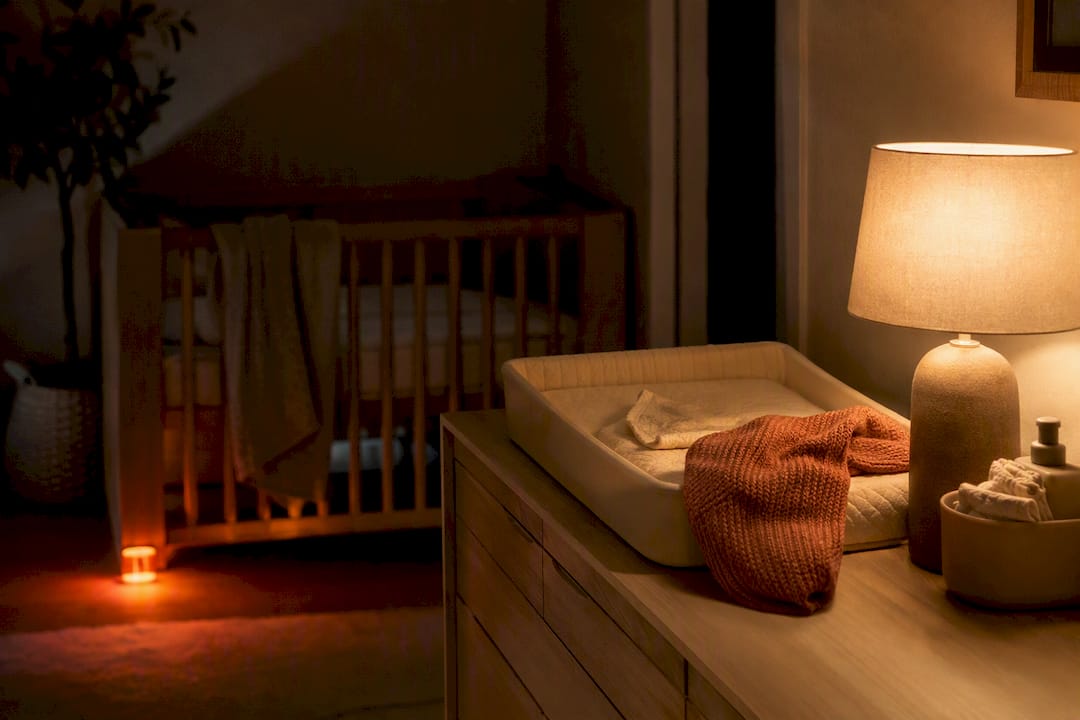 Warm layered lighting in a peaceful nursery