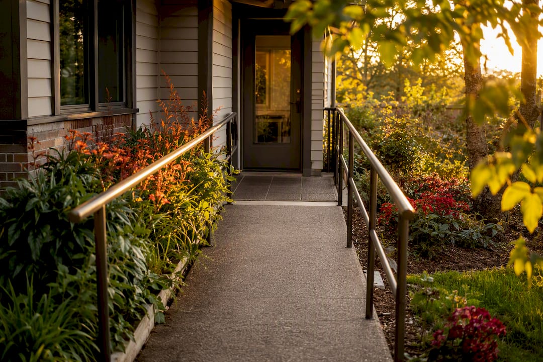Step-free home entry with gentle ramp and handrail