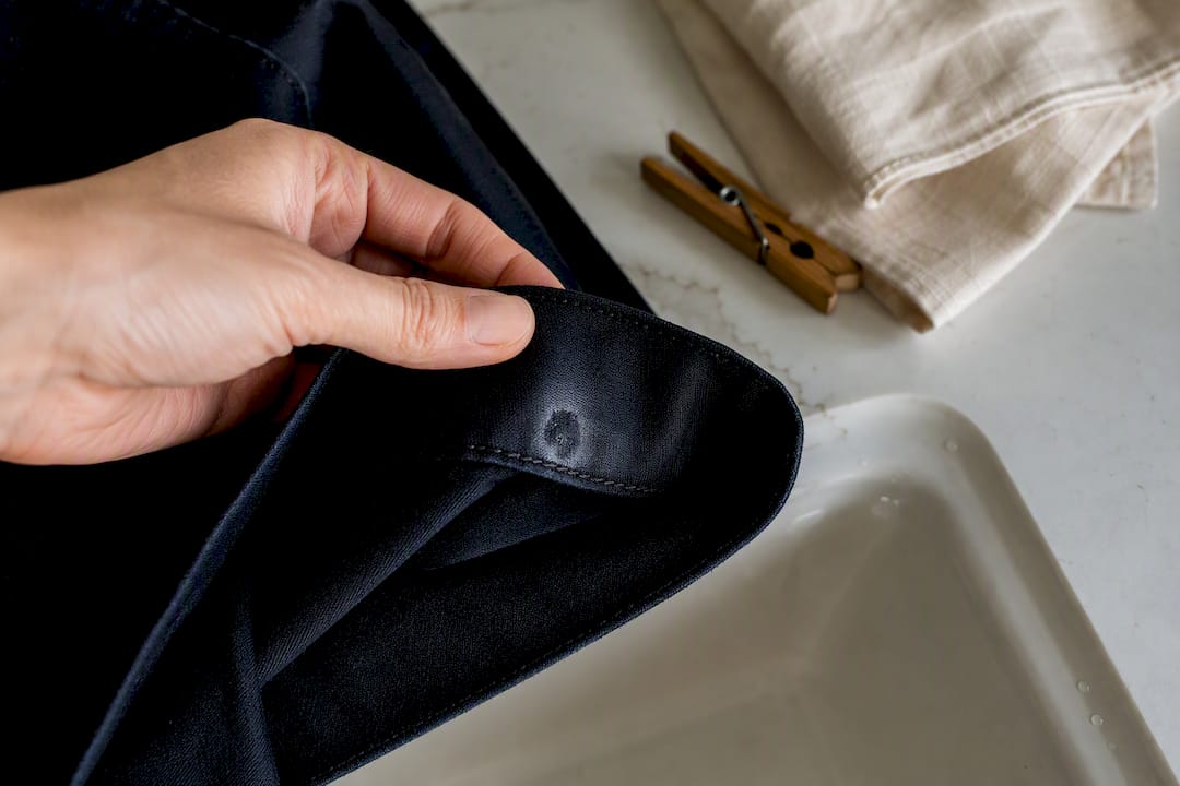 Checking a hidden hem after a perfume test
