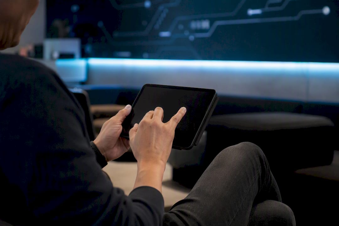 Developer hands interacting with smartphone for locale switching