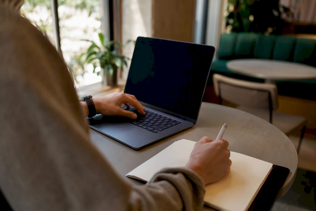 Hands holding stylus over tablet after mock interview