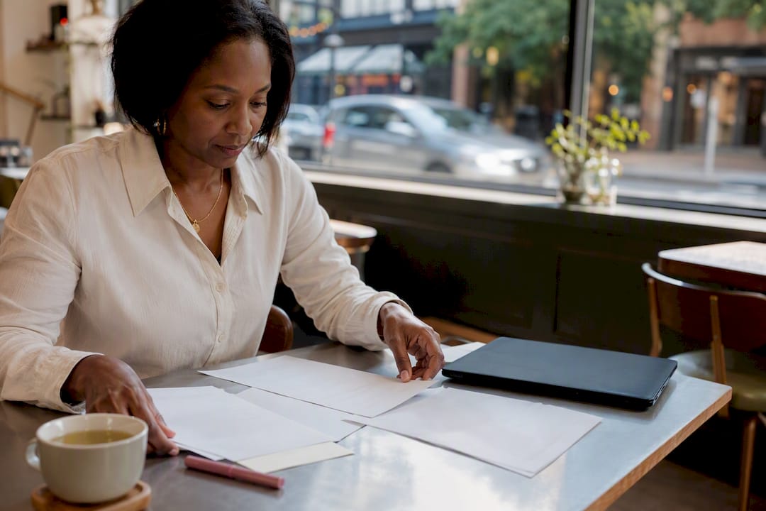 Executive arranging thought leadership notes