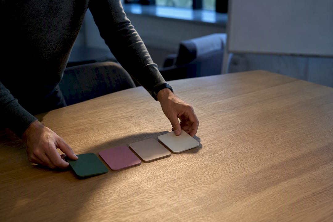 Hands aligning positioning strategy tiles