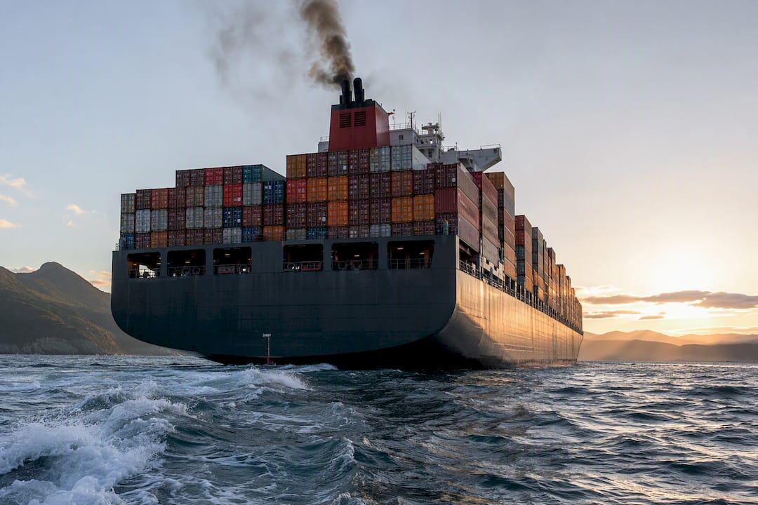 Cargo ship sailing on calm ocean waters