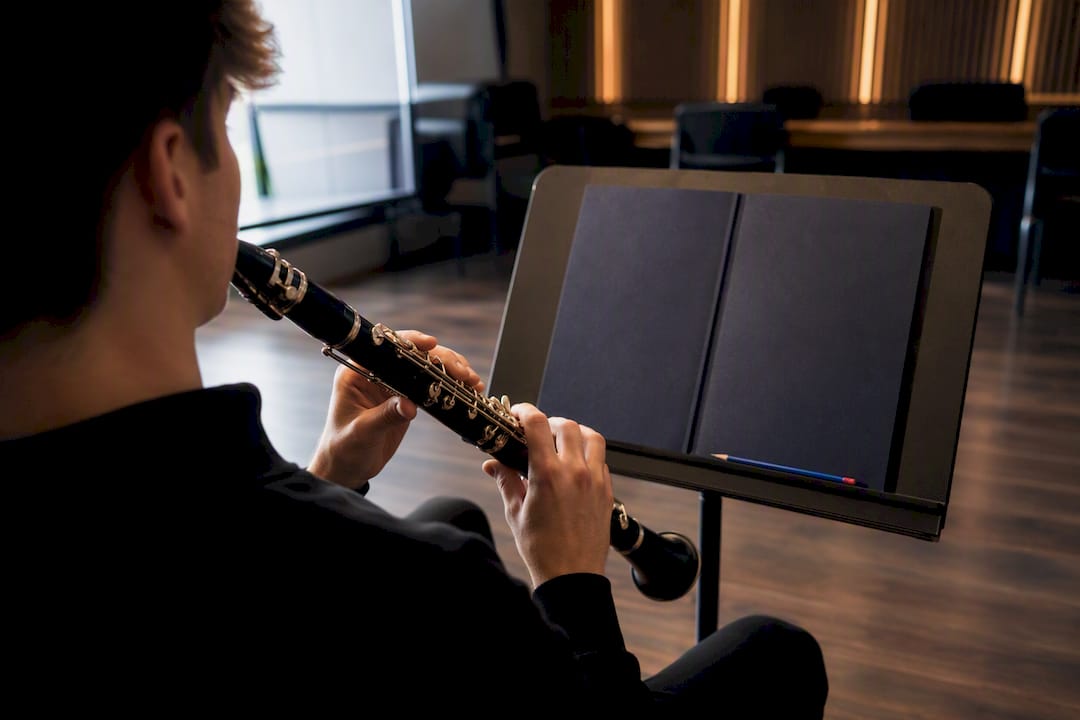 Young clarinetist preparing a difficult passage