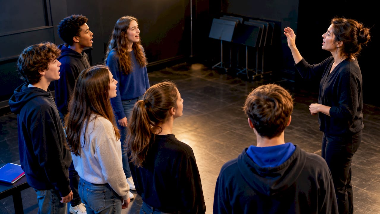 Youth ensemble practising call and response