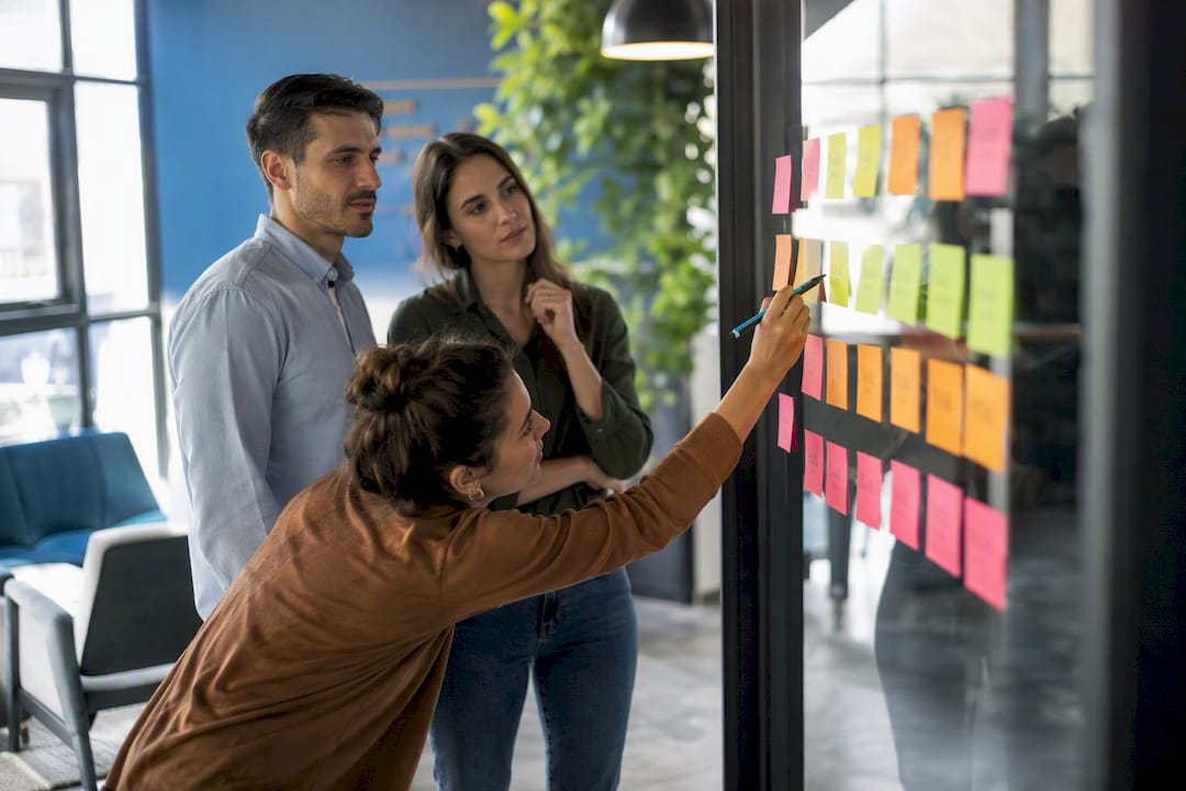 Marketing funnel sticky notes on whiteboard