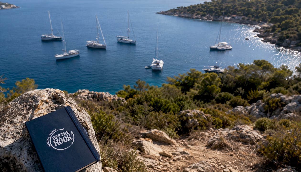 Yachts anchored in calm bay off Diaporos island