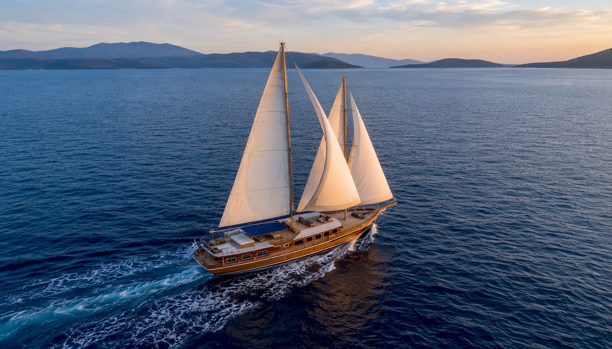 Wooden gulet motorsailer sailing on Aegean sea