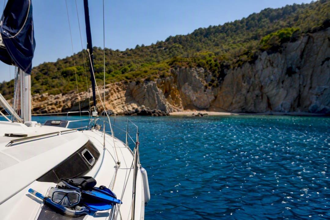 Private yacht anchored near snorkeling spot