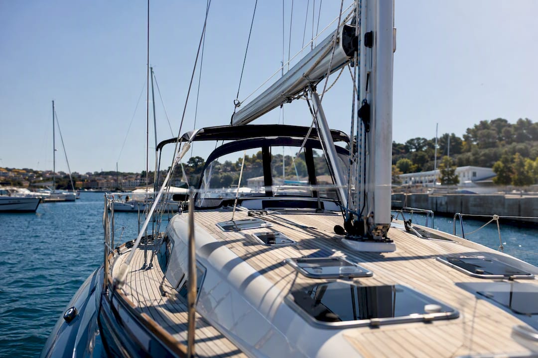 Private yacht moored at marina dock