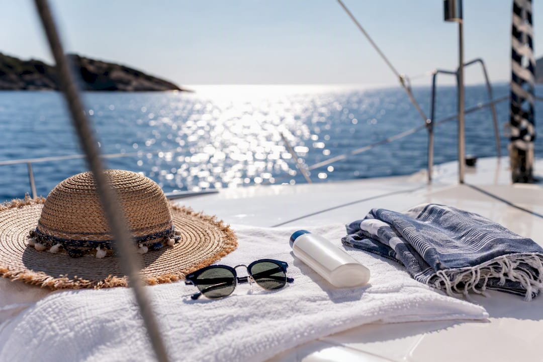 Sun protection items on yacht cockpit surface