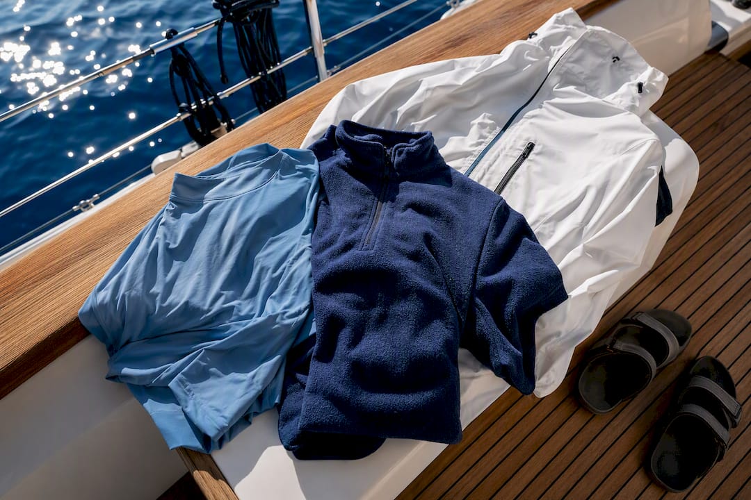 Sailing quick-dry clothing layers on yacht rail
