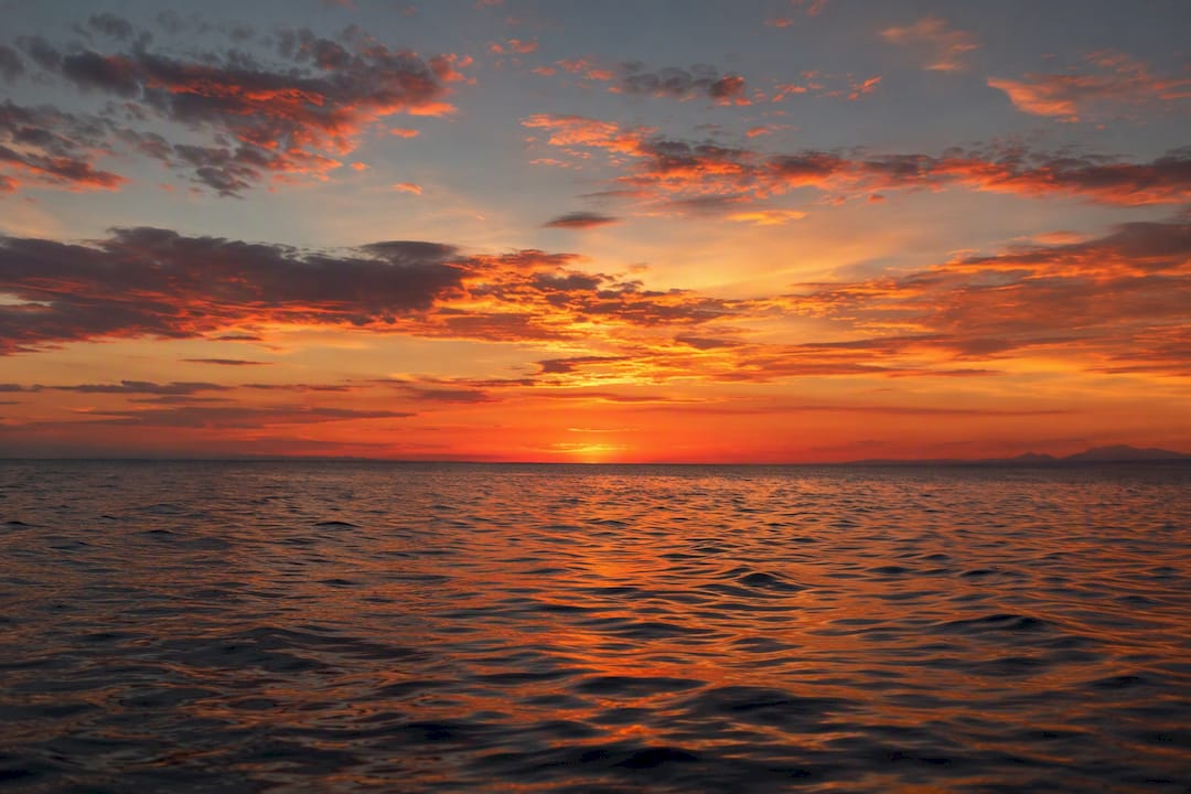 Dramatic Mediterranean sunset clouds over Aegean Sea