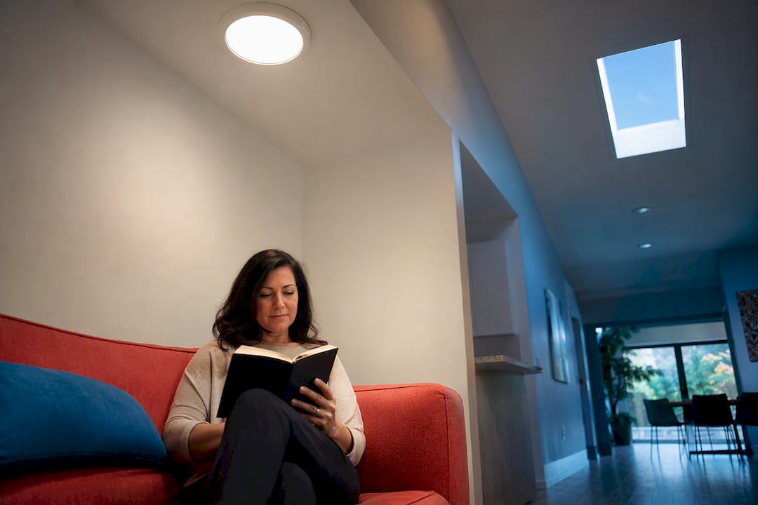 Florida room lit by skylight and solar tube