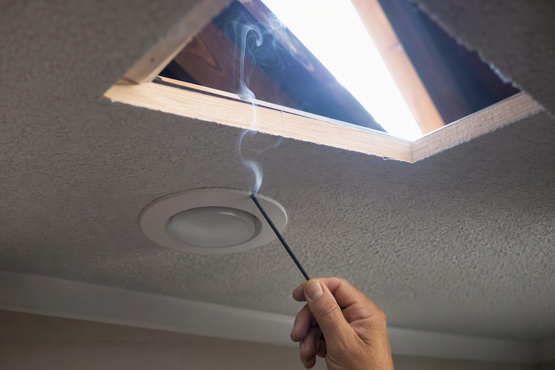 Smoke pencil testing attic air leakage