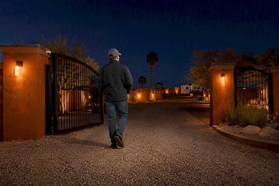 Worker entering a secure lodge gate