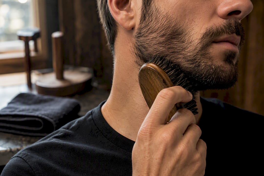 Boar brush redirecting sparse beard hairs