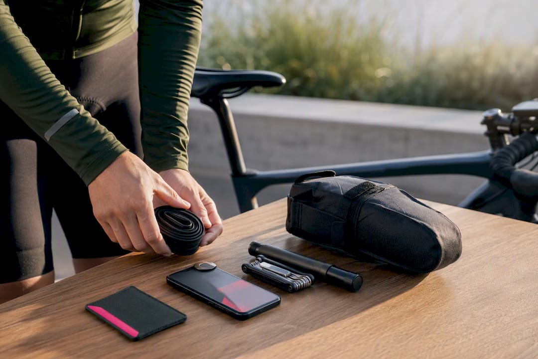 Cycling repair essentials beside a bicycle