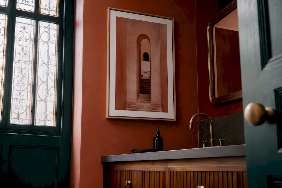 Bathroom vanity with well-placed large art print