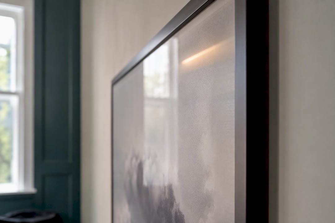 Glare reflected on glazed artwork