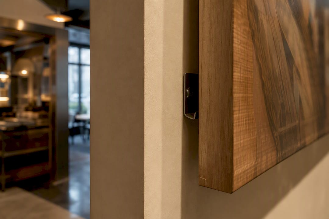 Secure wall fixing beside restaurant kitchen