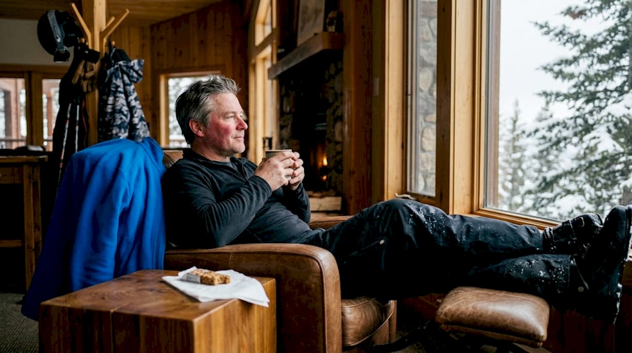 Resting skier in lodge afternoon break