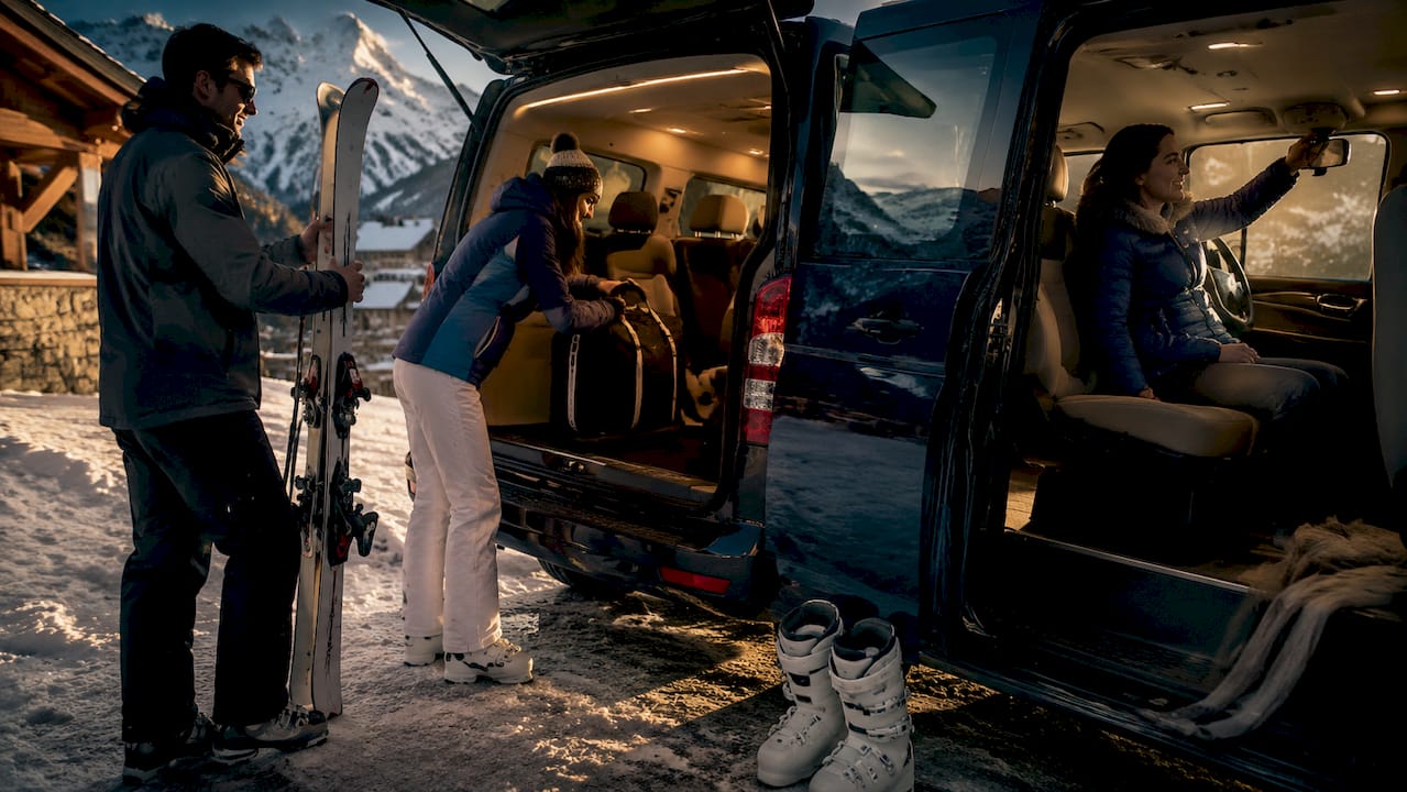 Private transfer van at snowy mountain stop