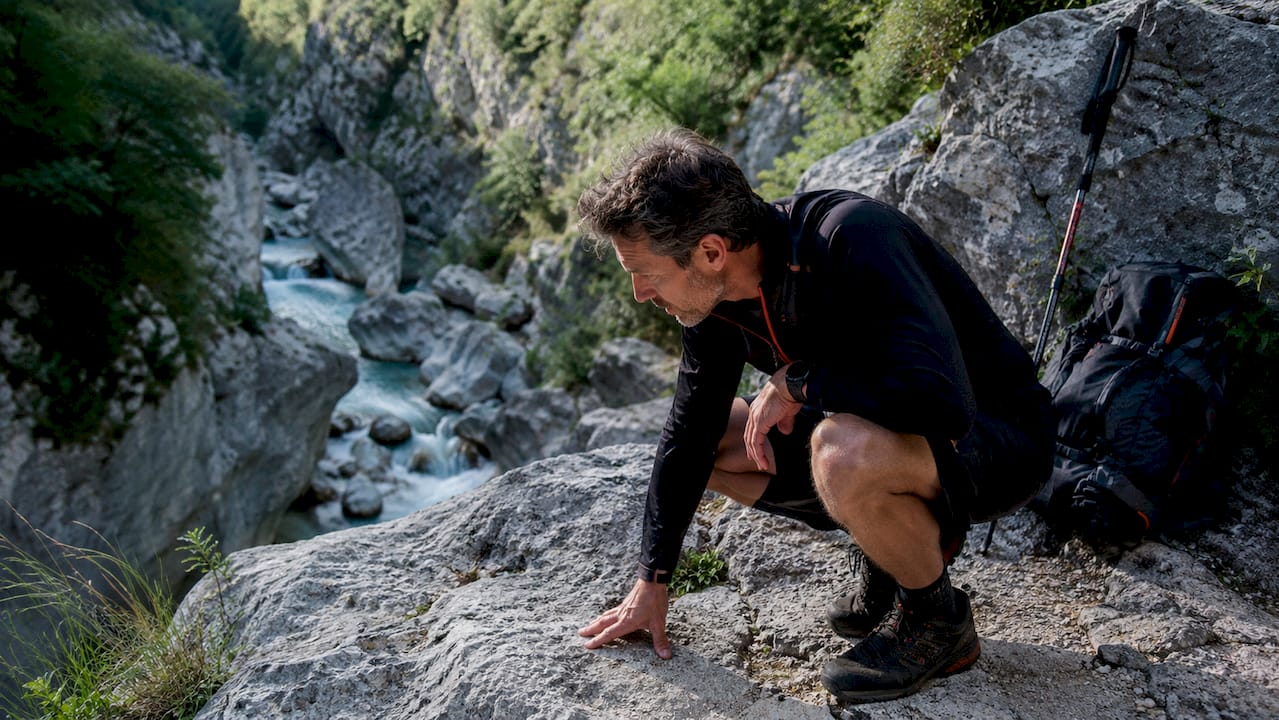 Hiker overlooking Gorges du Loup canyon valley