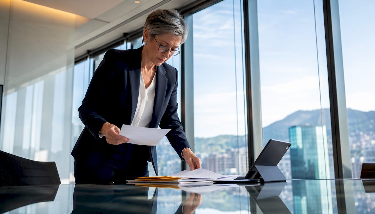 Financial consultant reviewing Swiss tax documents