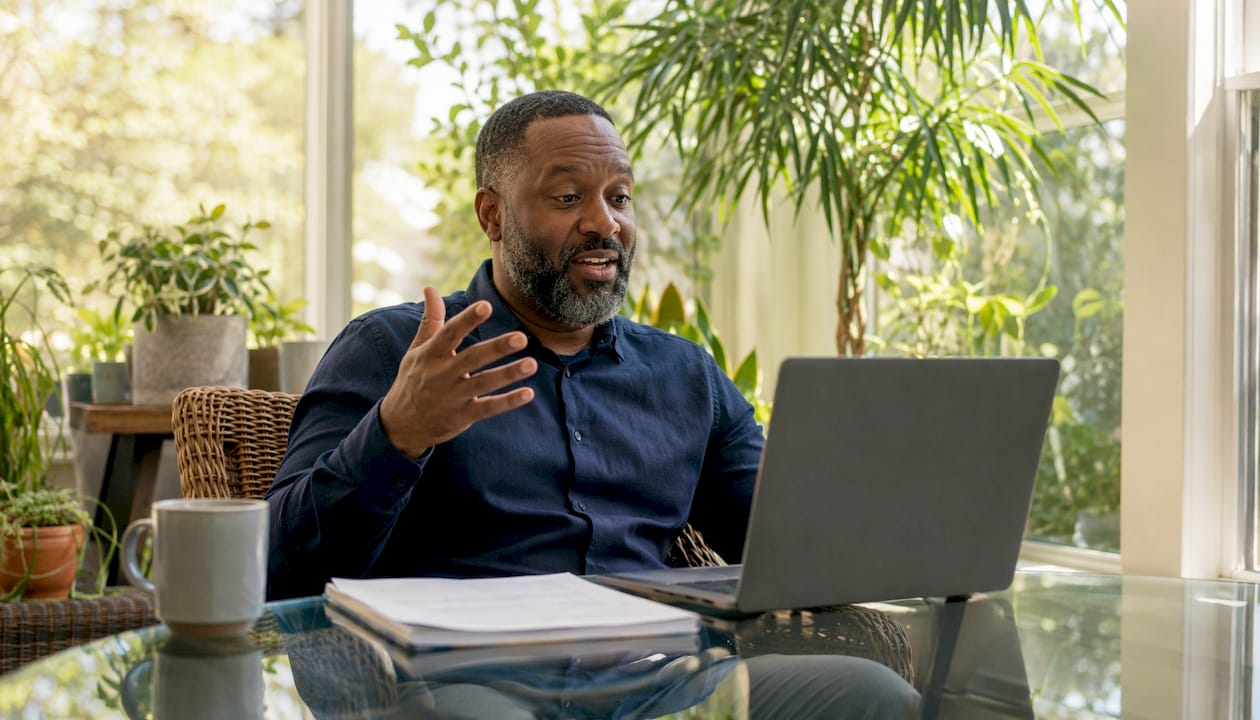 Man expressing energy during Zoom interview