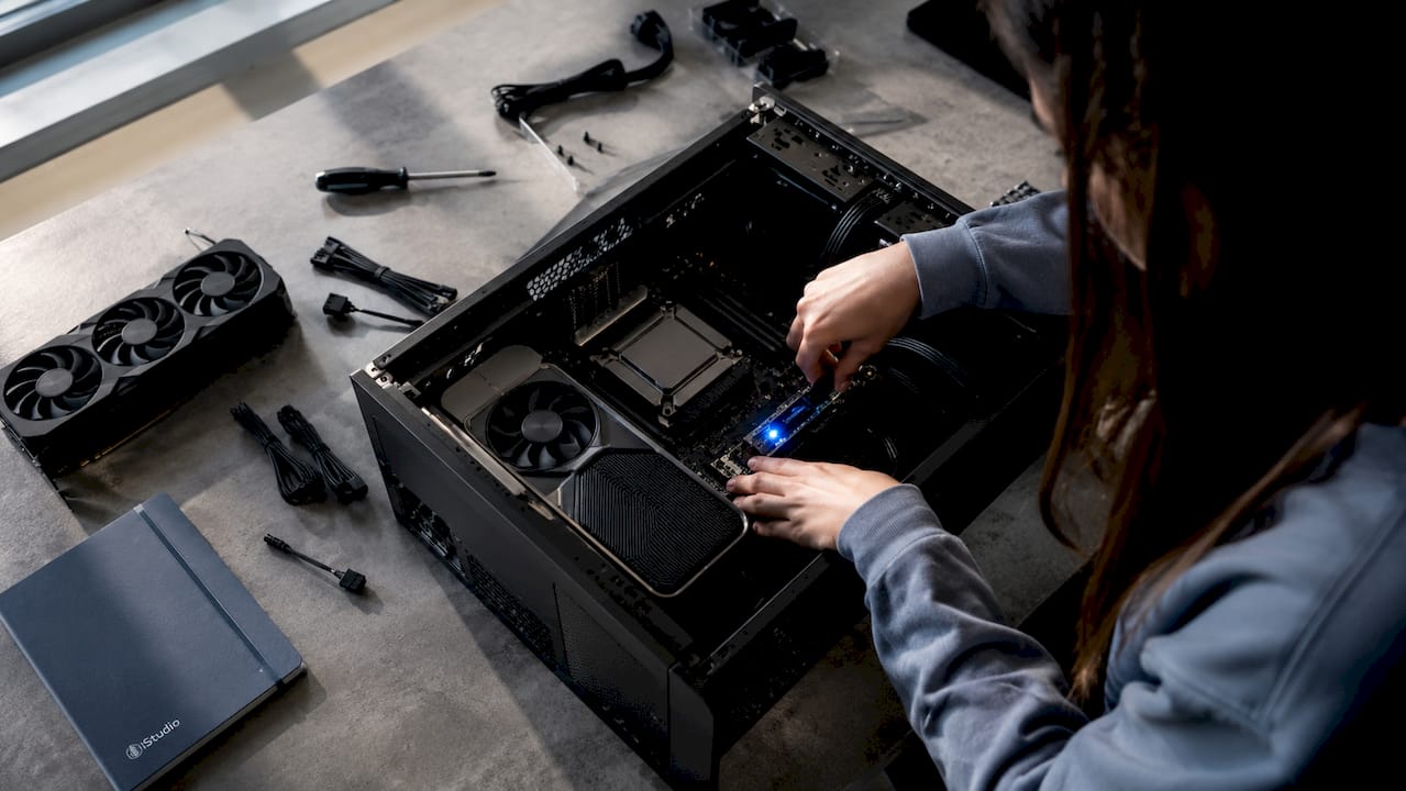 People putting together AI computer hardware with their hands