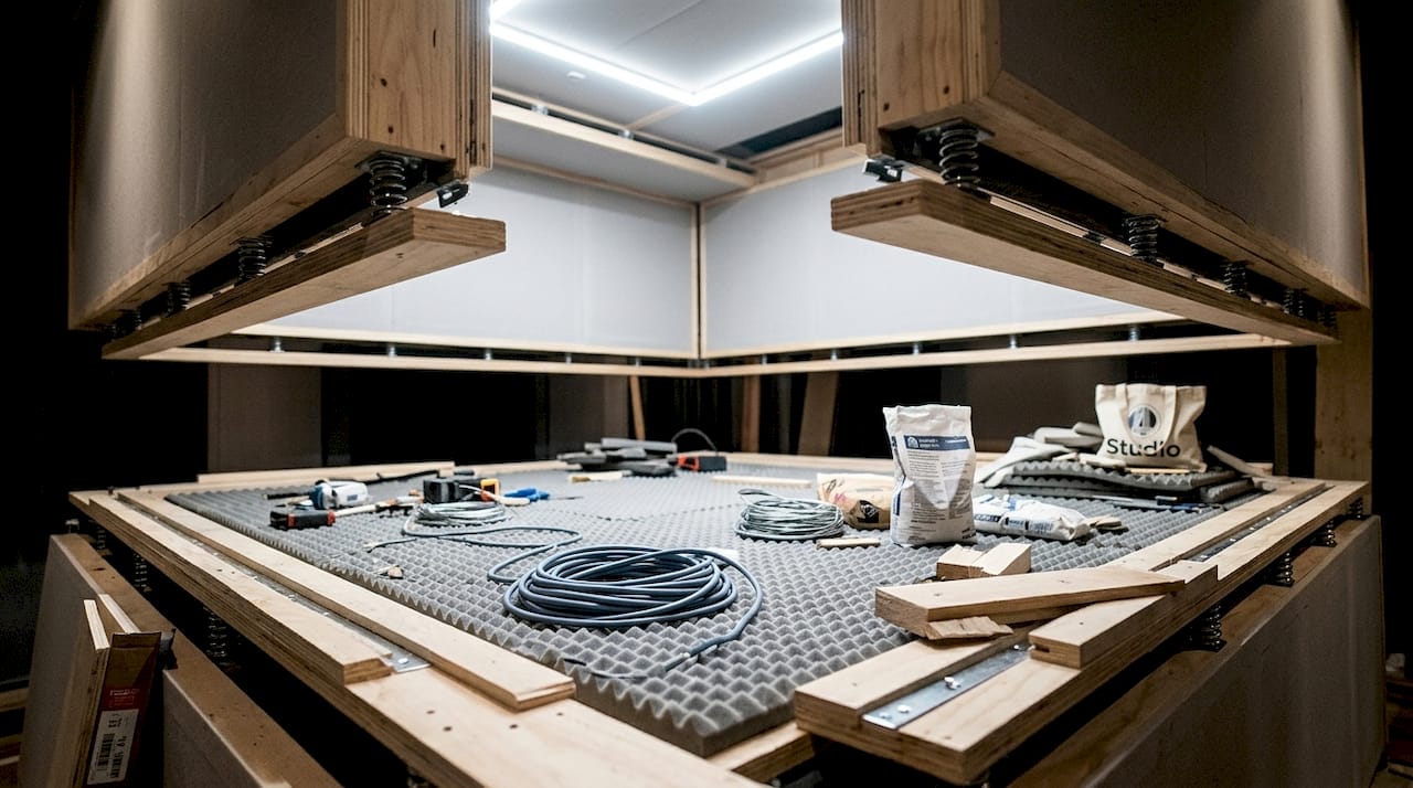 Explaining Decoupling in the Studio: A Complete Guide for 2026 1 Studio equipped with a floating box-in-box insulation system
