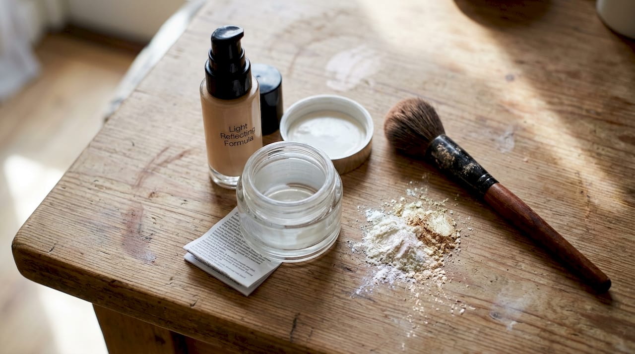 Light reflecting makeup ingredients on kitchen table