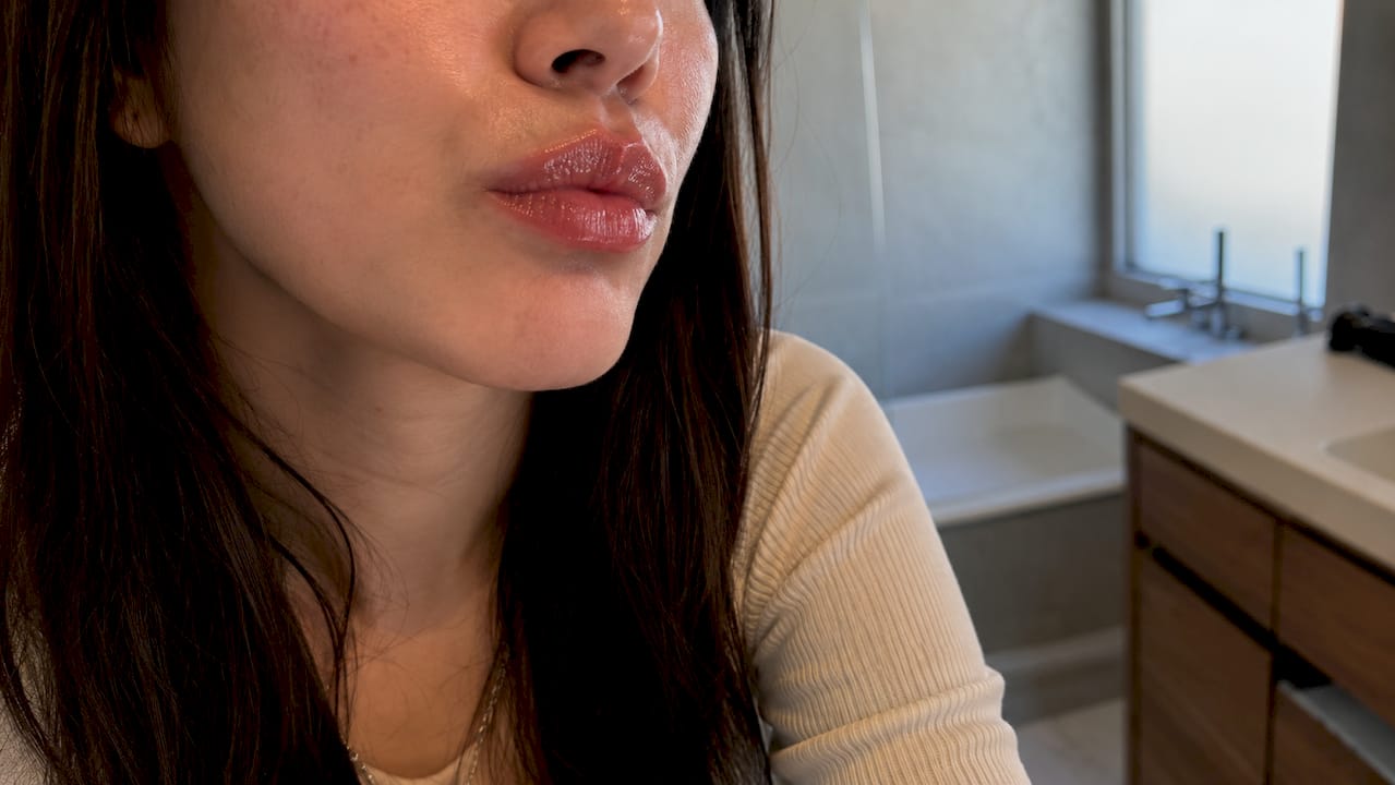 Close-up of lips showing plumper effect