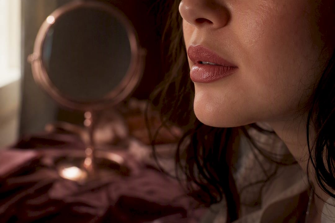 Lips with soft satin lipstick sheen close-up
