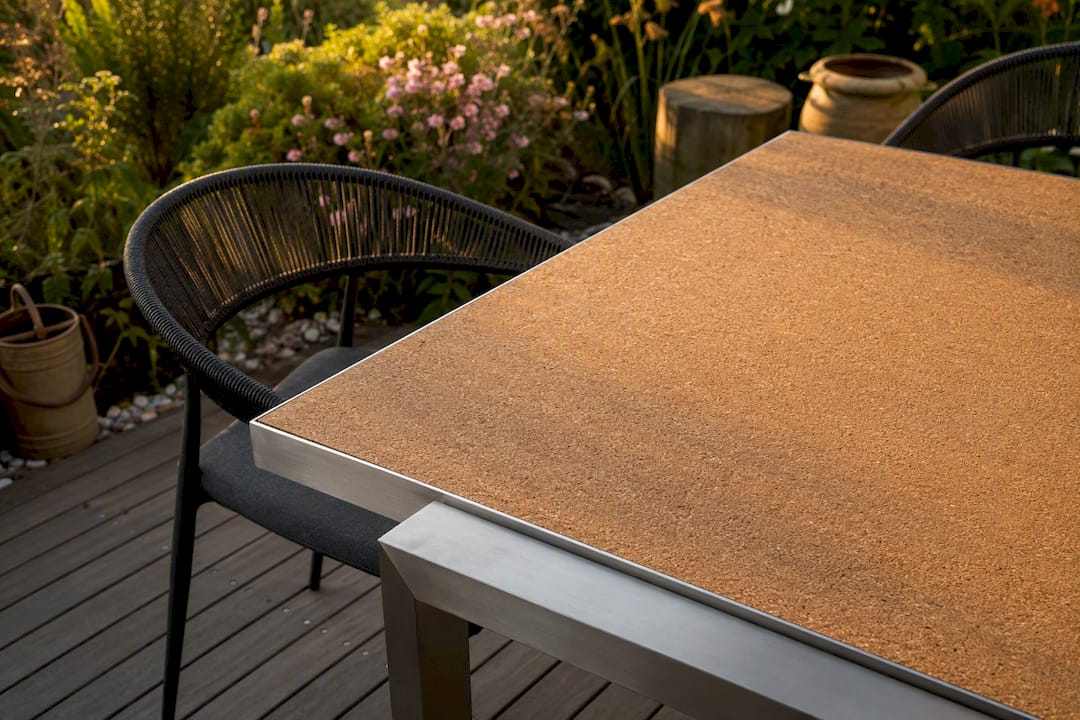 Cork veneer table with metal base detail