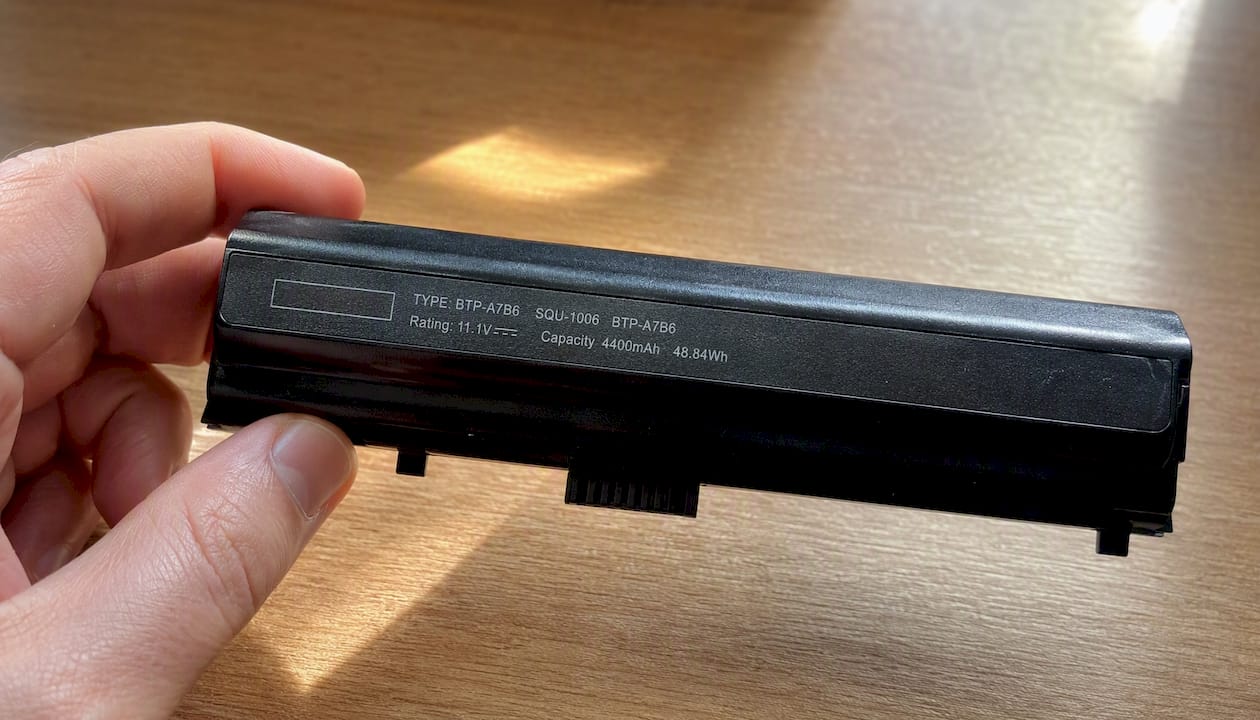 Close-up of laptop battery label details