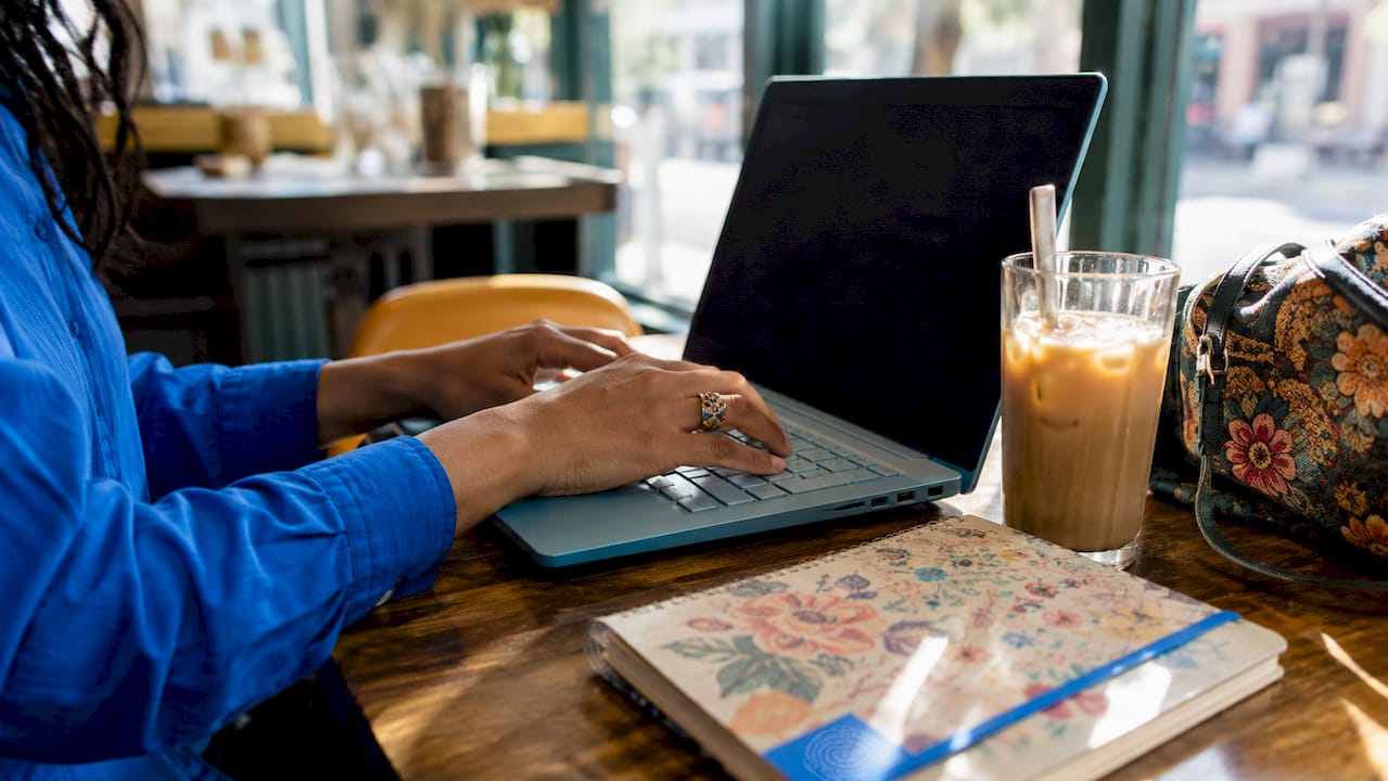 Role of case management in investigations: a guide 1 Close-up of hands typing on laptop at office desk