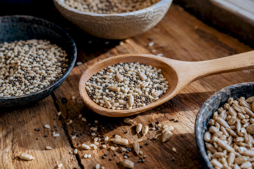 Wooden spoon with sesame and chia seeds