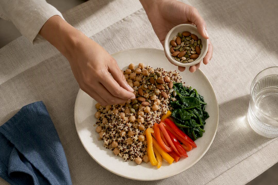 Protein anchored meal with seed topping