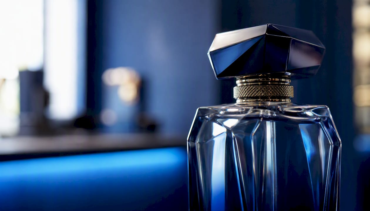Close-up of luxury perfume bottle detail in boutique