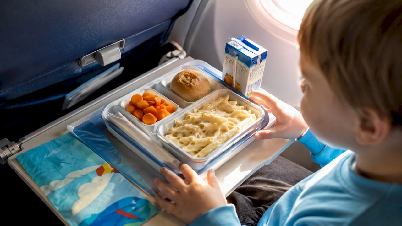 Child meal tray with kid-friendly airplane food