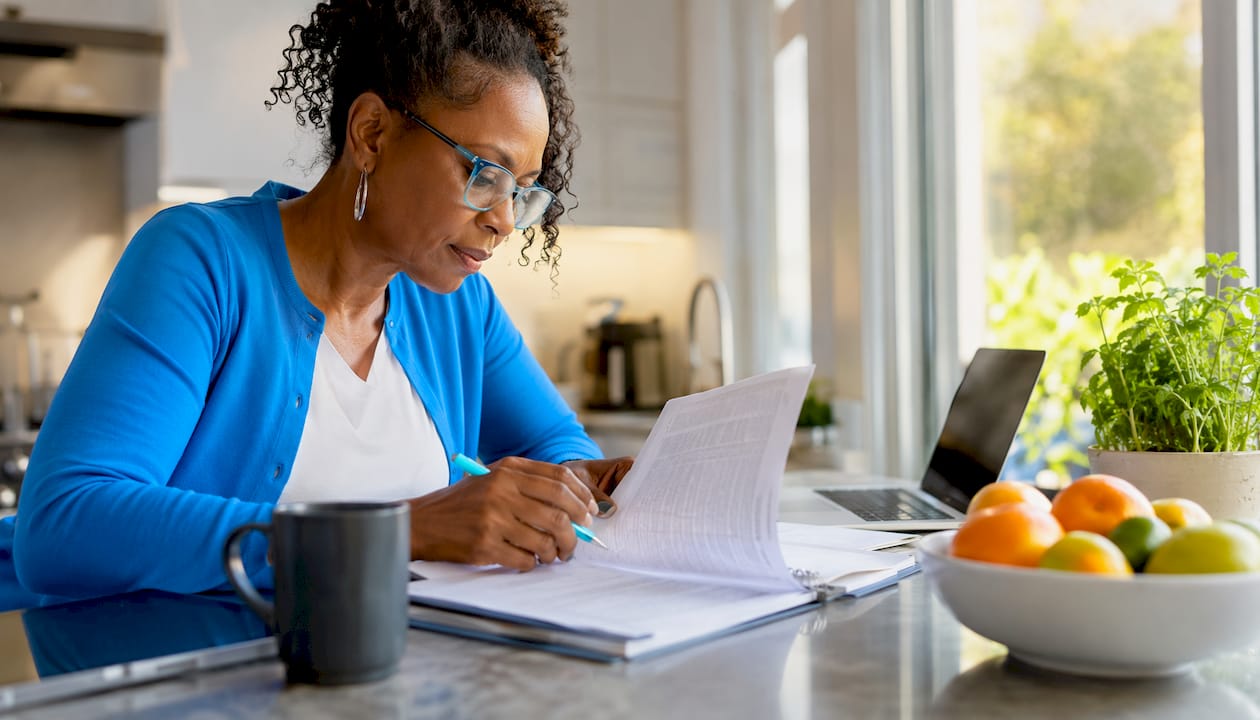 Tax advisor reviewing per diem legal documents