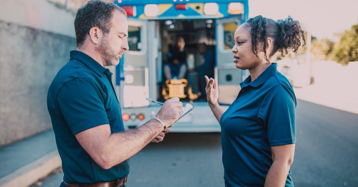 Diverse crisis response team coordinating with focus, 'Communication Skills' on office wall.